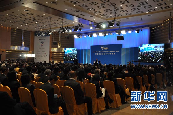 博鳌亚洲论坛秘书长周文重宣布博鳌亚洲论坛2013年年会开幕式正式开幕。 摄影：新华网记者  纪惊鸿