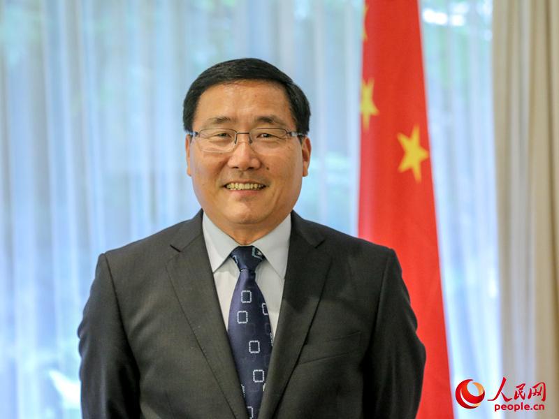 中国驻悉尼总领事李华新通过人民网向全国人民