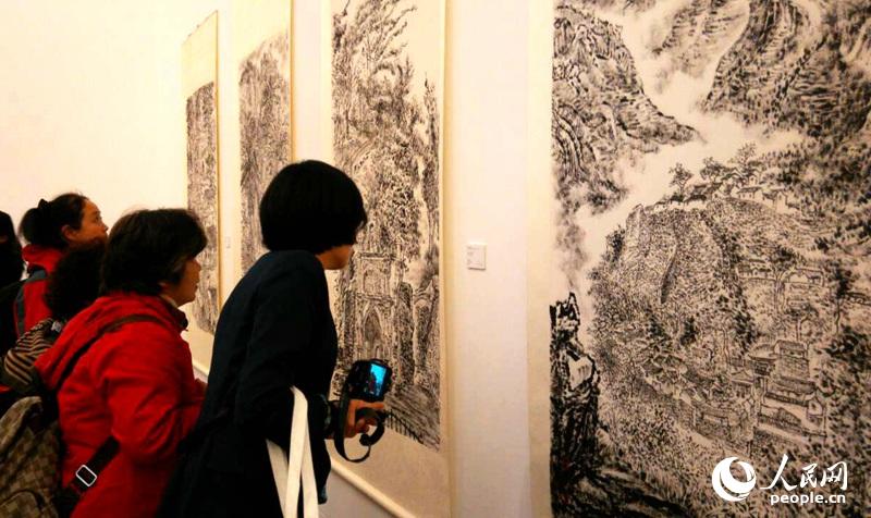 中国画家黄国强的《京郊爨底下村》等作品.