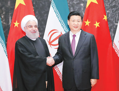 6月10日，国家主席习近平在青岛同伊朗总统鲁哈尼举行会谈。新华社记者 丁 林摄