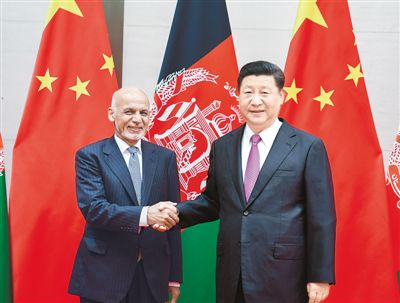 6月10日，国家主席习近平在青岛会见阿富汗总统加尼。新华社记者 高 洁摄