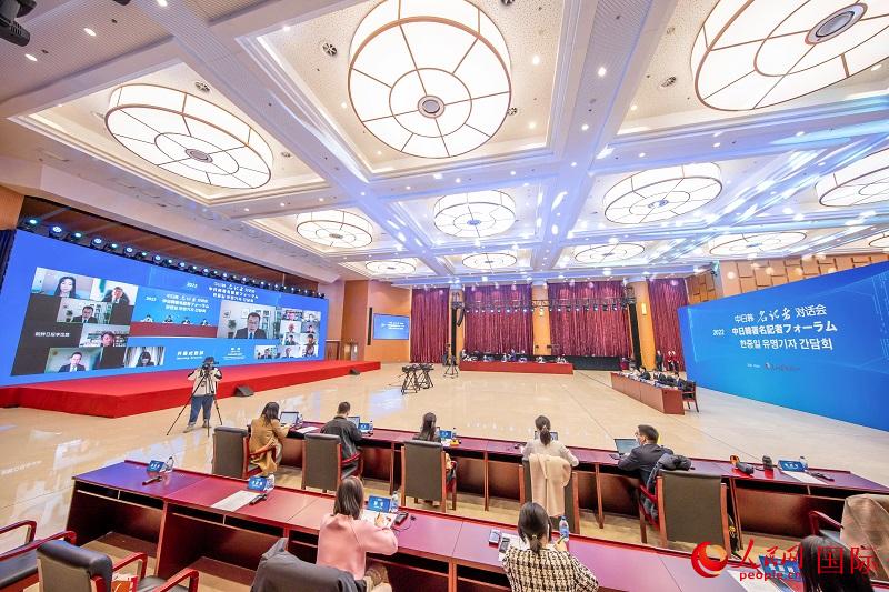 The scene of the 2022 China-Japan-Korea Famous Journalists Dialogue. Photo by People's Daily Online reporter Zhang Wujun