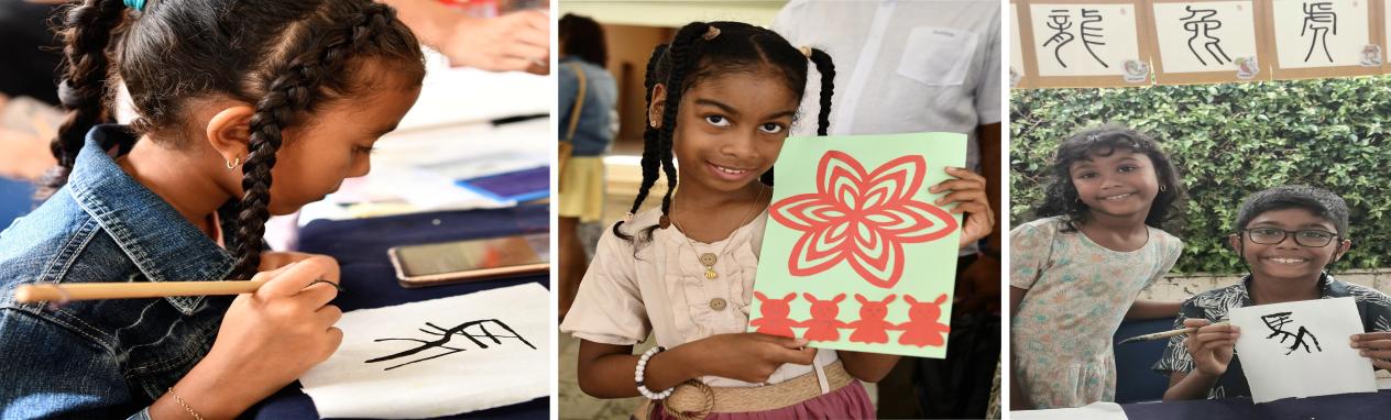孩子们展示剪纸和书法作品。中国驻毛里求斯大使馆文化处供图