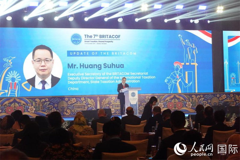 “一带一路”税收征管合作机制秘书处秘书长、中国国家税务总局国际税务司副司长黄素华致辞。人民网记者 曹师韵摄