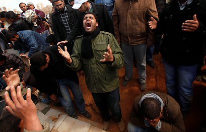 组图:透视空袭打击和战争之中利比亚人民的生