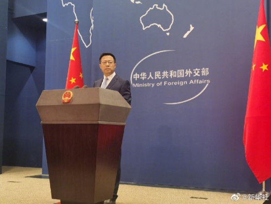 赵立坚支持维族群众依法维权