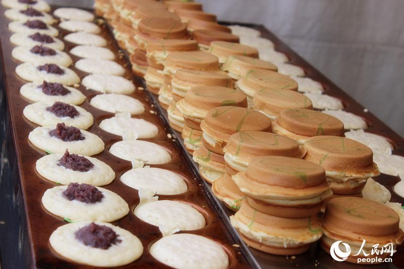 9����ʳչ�еľ�����ʳ����Ӱ ʢ���ˣ�